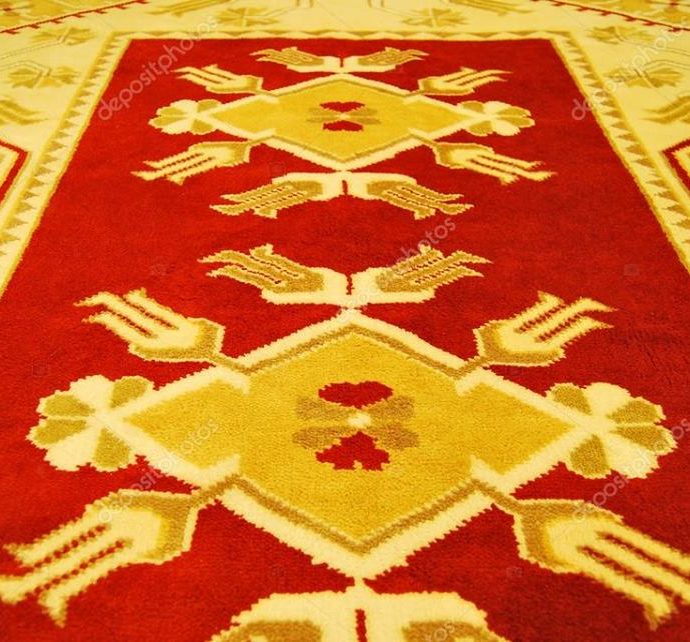 Κόκκινο κρασί στο χαλί